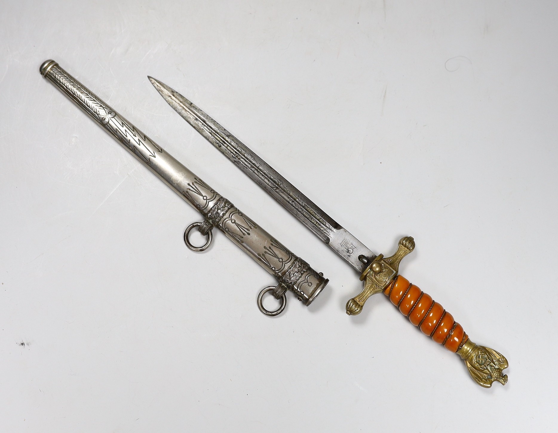 A German Kriegsmarine Officers dagger, by Eickhorn, Solingen, with associated German scabbard 41.5 cm